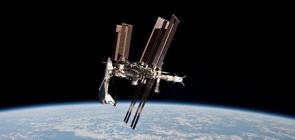 Space Shuttle Endeavour docked to ISS / source and (c) NASA